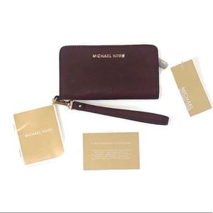 Michael Kors Slim Tech Wristlet- Merlot